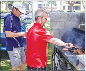 Golfers enjoy tournament, picnic