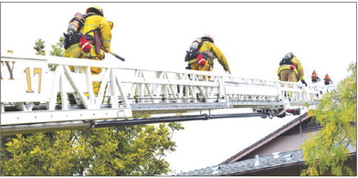 Firefighters practiced maneuvers in Mutual 15 on May 3