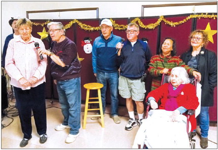 Karaoke singers celebrate with holiday tunes