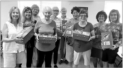 Members pack 50 boxes for Operation Christmas Child