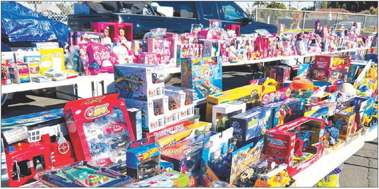 Generous donations by LWers bring holiday cheer to OC kids