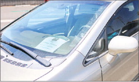 Failure to display visitor pass can result in $25 fine