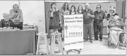 Singers don costumes for festive Halloween karaoke