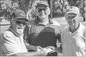 Fifty golfers complete shotgun scramble on Oct. 27