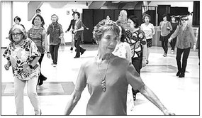 Holiday line dance party is Dec. 4