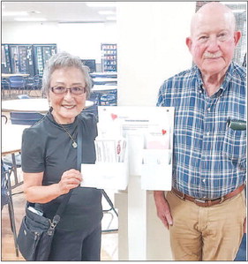 Pick up and drop off donation envelopes in Clubhouse 6