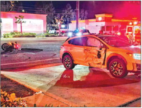 Vehicle and motorcycle collide near U.S. Post   Office on Westminster Boulevard; injury reported