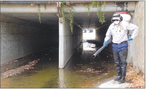 Flood channel regularly treated for mosquitoes