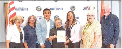 Resident receives Woman of Distinction honor