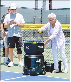 Pickleball Club members learn how to use Titan ball machine