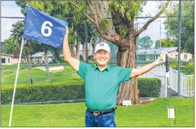 Yong J. Kim scores hole-in-one on hole No. 6