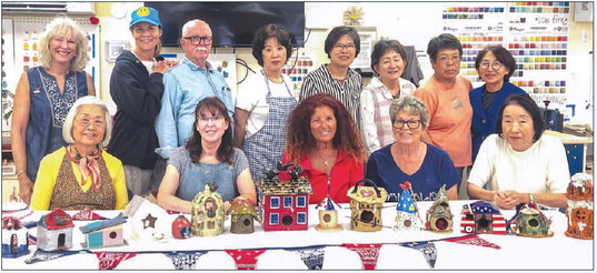 Clay Crafters  create patriotic  birdhouses