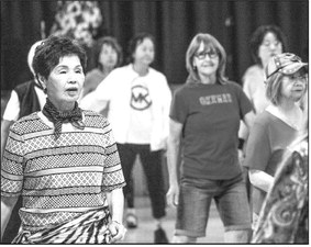 Celebrate summer with the Joyful  Line Dance Club July 23 in CH 2